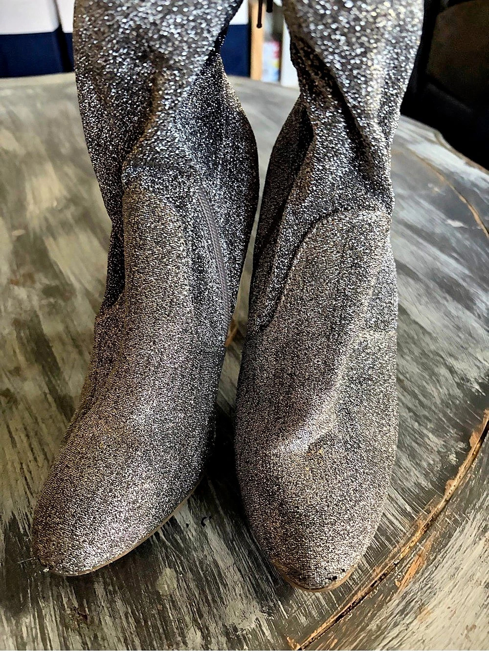 Glitter Pointed-Toe Heels in Gray Bottom worn down..